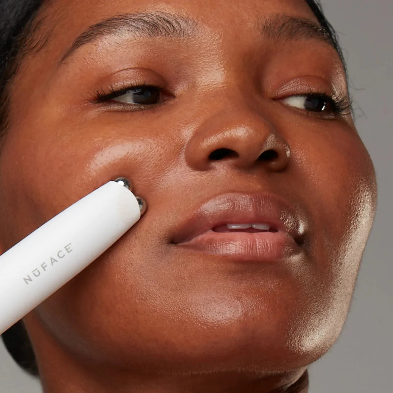 NuFACE FIX MicroWand instantly lifts and smooths fine lines around eyes and lips with gentle microcurrent for a refreshed, youthful look.