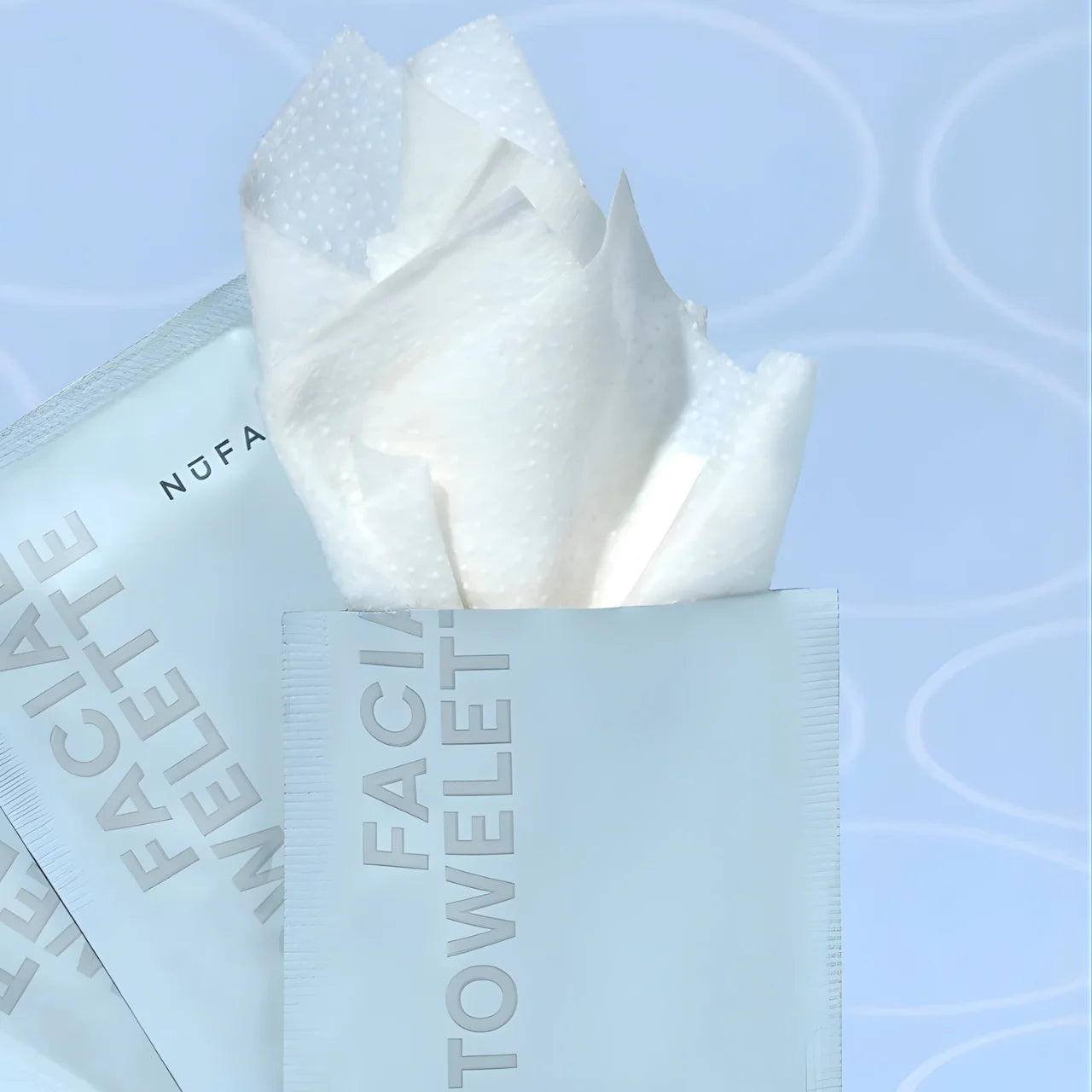 NuFACE Prep-N-Glow hydrating facial cleansing wipes with hyaluronic acid and antioxidants for smooth, refreshed, glowing skin.