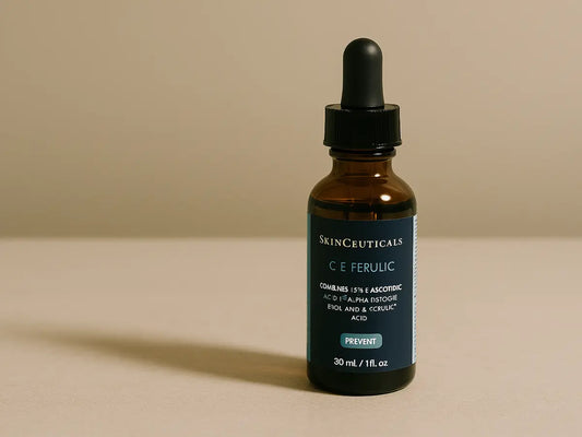 A bottle of SkinCeuticals C E Ferulic serum on a neutral background, showcasing the iconic SkinCeuticals Vitamin C formula reviewed by dermatologists.