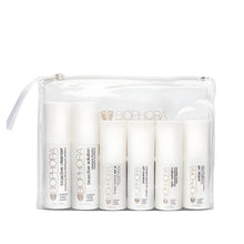Biophora Acne Prone Travel Kit featuring cleanser, solution, gel, hydration, antibac veil, and tinted mineral SPF 30 for clearer, balanced skin.