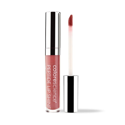 Colorescience Peptide Lip Shine SPF 30 in Coral – Moisturizing lip gloss with sun protection, a peachy-tone shimmer, and a smooth, non-sticky finish.