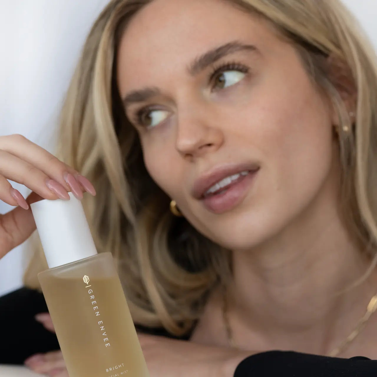 Green Envee Bright Facial Mist to hydrate deeply and soothe sensitive skin.