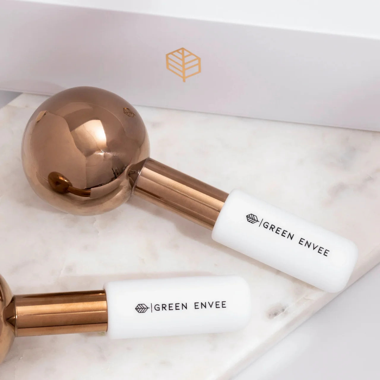 Green Envee Cryo Globes cooling facial tools to calm inflammation, tighten pores, and refresh dull skin.