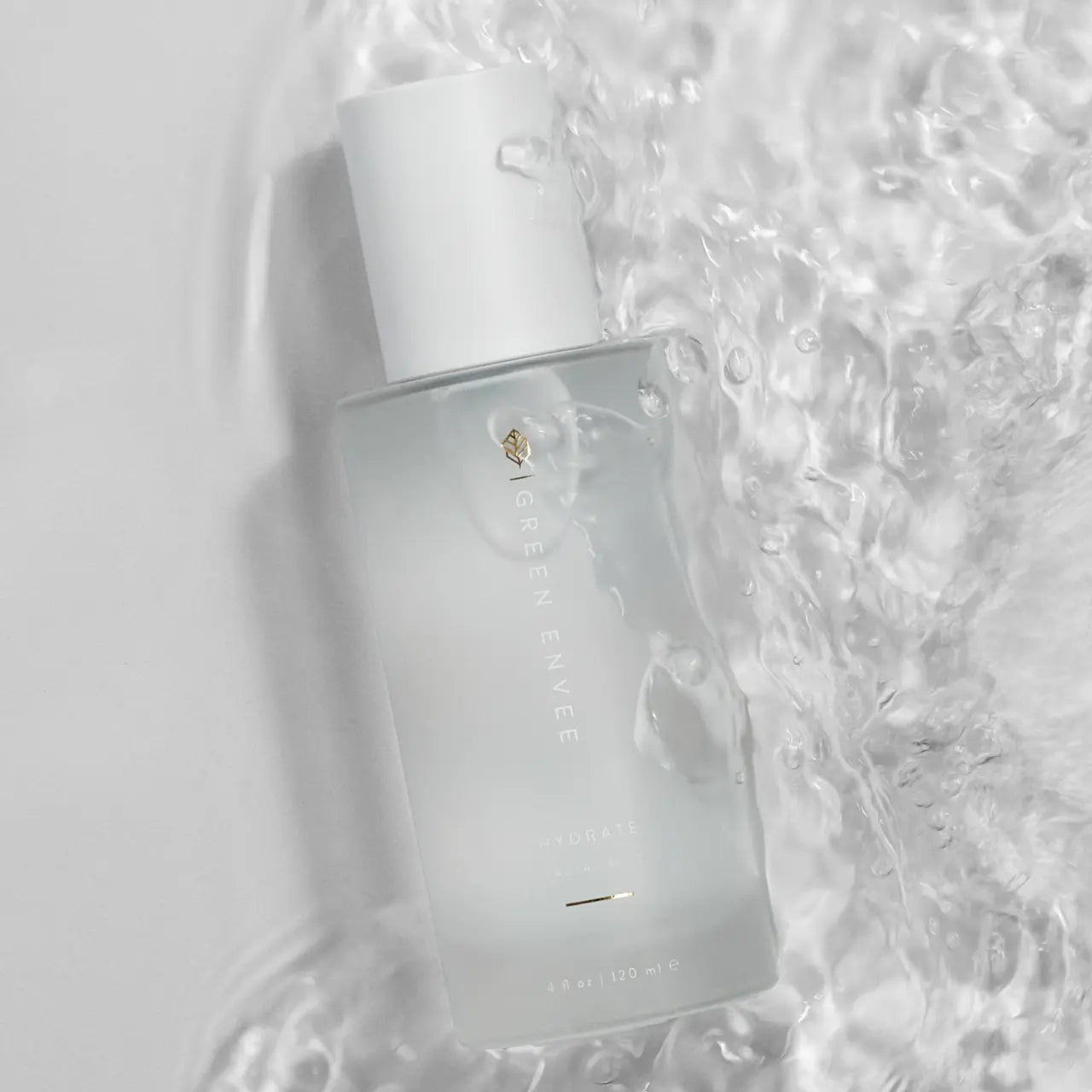 Green Envee Hydrate Facial Mist delivering deep hydration for plump, refreshed skin.