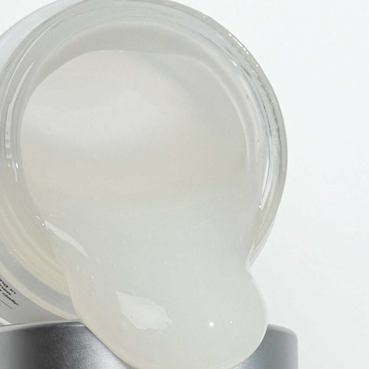 Green Envee Rejuvenate Brightening Enzyme Masque exfoliates gently to smooth and refine skin texture.