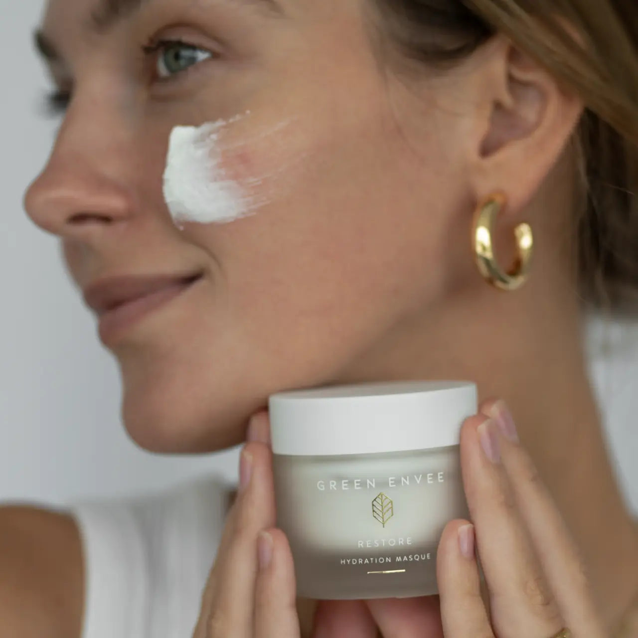 Green Envee Restore Hydration Masque gently renews skin, smoothing texture and restoring radiance for a refreshed complexion.