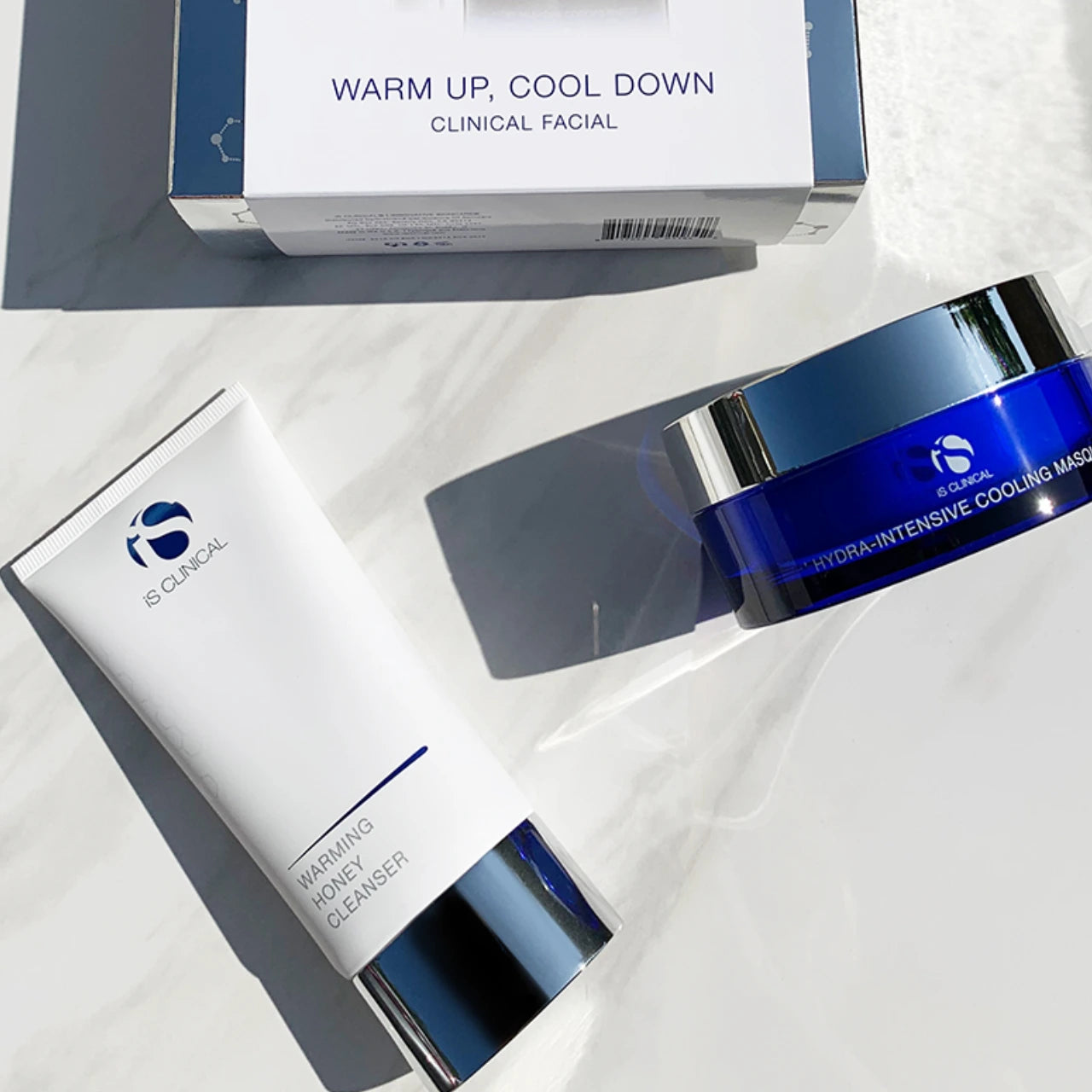 iS CLINICAL Warm Up Cool Down deeply cleanses skin, removing impurities for a fresh, radiant glow.